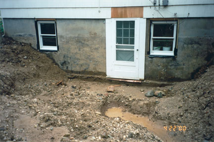 Seemingly endless rains began to erode the sandy backfill