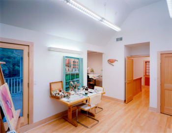 2000 My the new custom built studio. L-R Door to outside deck, opening to 2nd studio, entry door, closet.